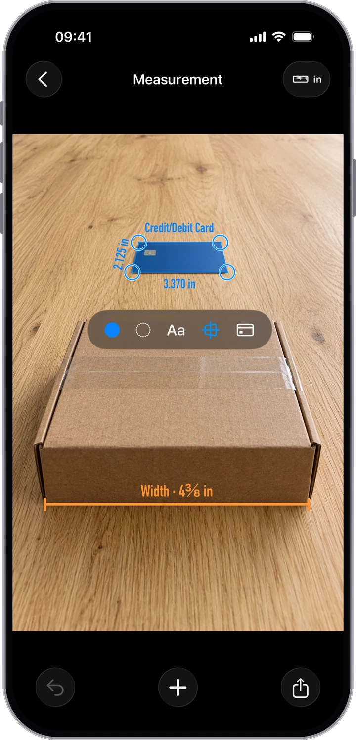 A box photographed at an angle, with the card marked by its four corners