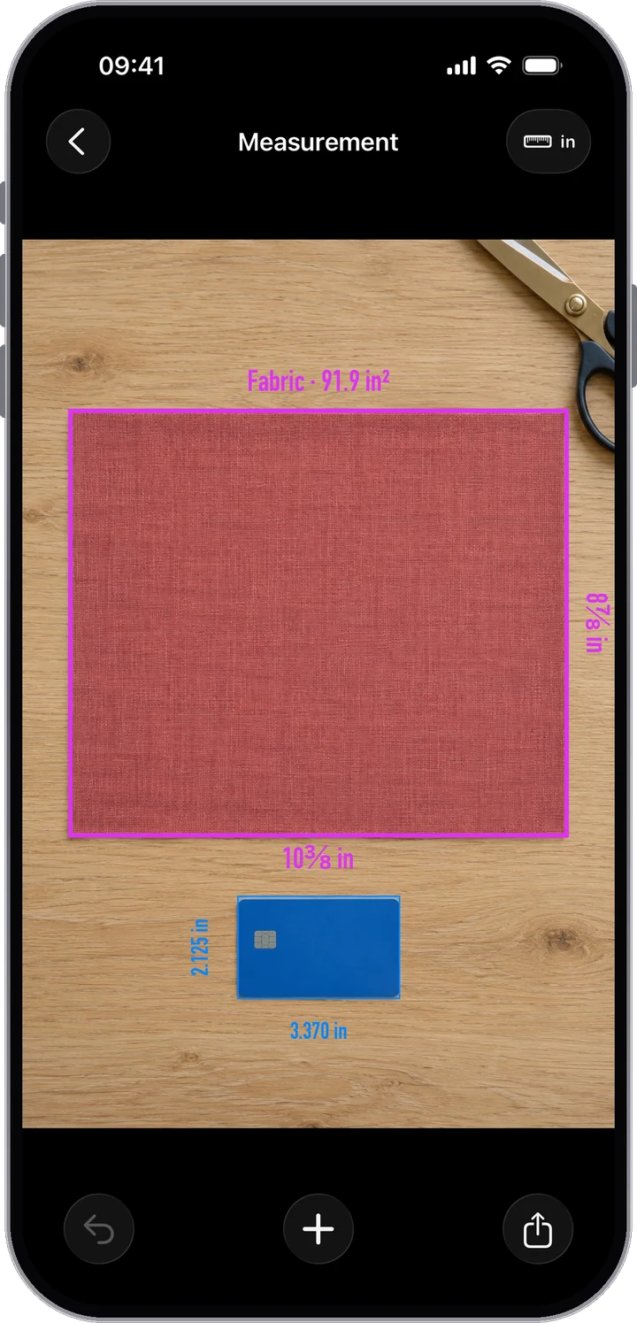 A piece of fabric measured with a rectangle, showing its sides and area